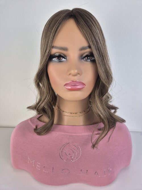 Maya Hair Silk lite topper 14 inches in length brunette with blonde highlights displayed on a Mannequin