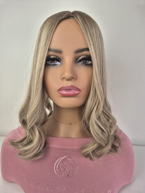 Sophia hair topper blonde 16 inches light natural blonde with a level 8 root displayed on a mannequin.