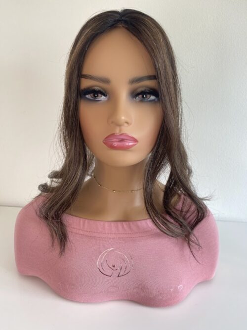 Milan Hair Topper 16 inches in length brown hair with subtle hair lights displayed on a mannequin