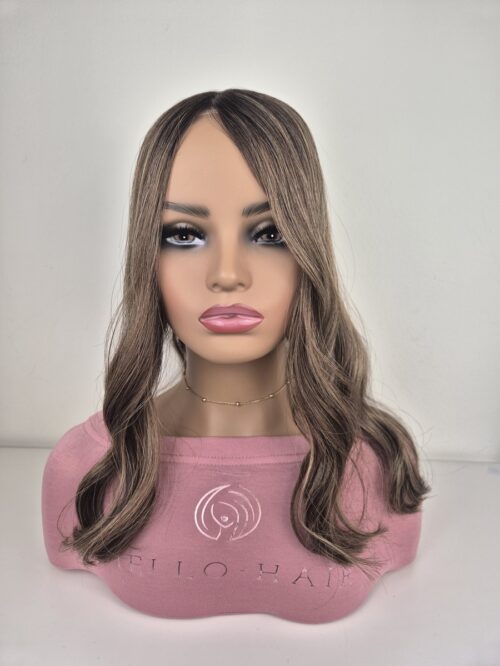 Lola Handtied silk top hair topper 18 inches in length brunette with blonde highlights displayed on a mannequin.