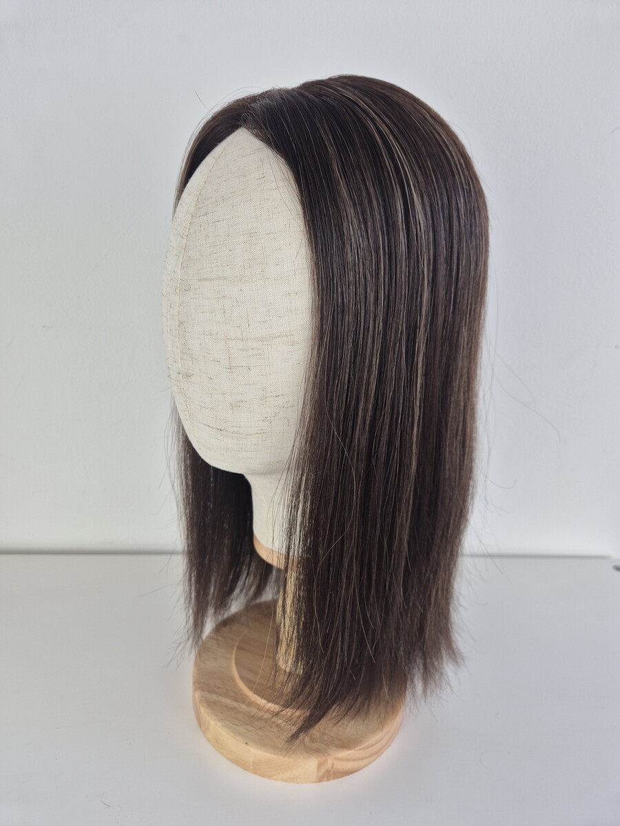 Leanne lace topper 16-inch length darkest brown with blonde with highlights displayed on a mannequin