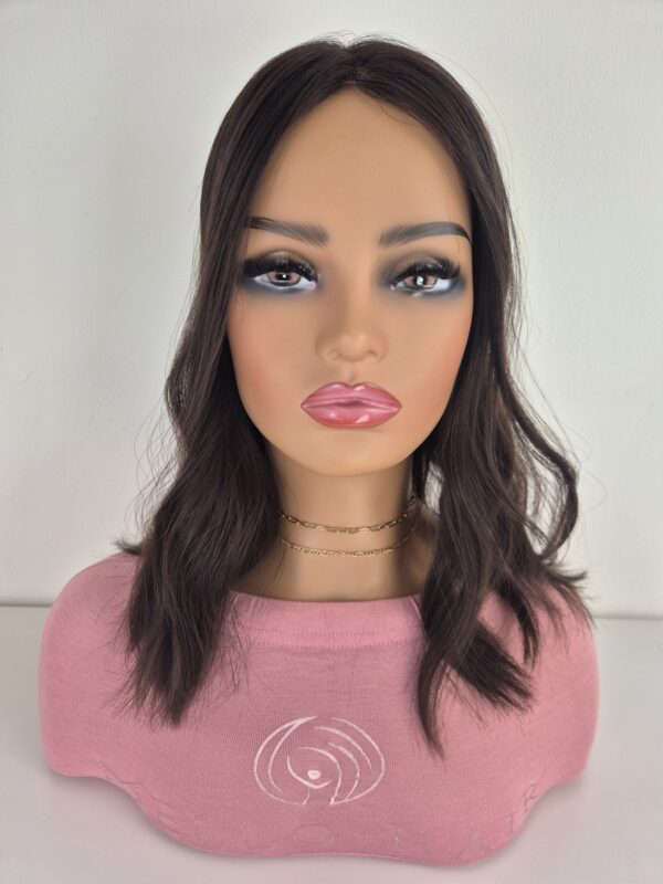 Cara Lace Topper darkest brown 16 inches styled in a wave and displayed on a mannequin