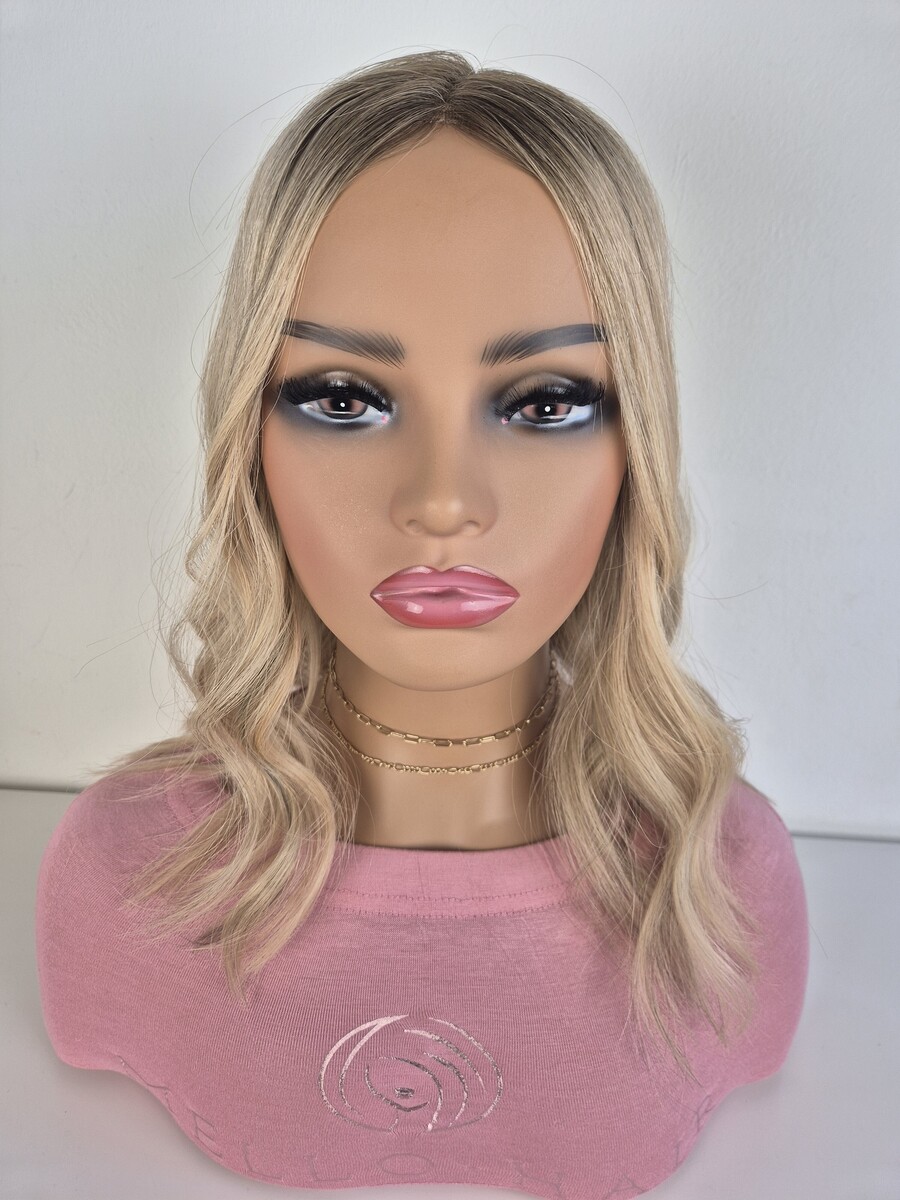 Kelly Lace Topper 14-inch creamy blonde styled straight displayed on a mannequin