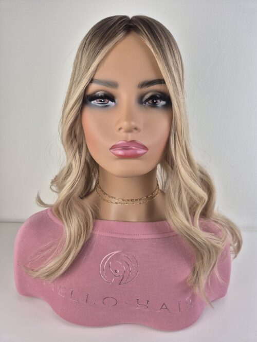 Luna Silk lite hair topper 18 inches in length medium blonde with subtle dimensions displayed on a Mannequin