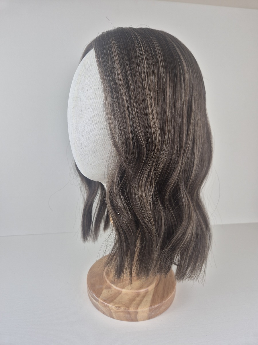 Carmel lace topper 15 inches dark brown with ash blonde highlights displayed on a mannequin