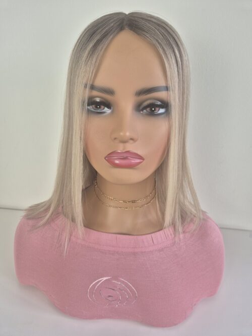 Serena lace topper 14-inch length cool blonde with a natural ash root displayed on a mannequin