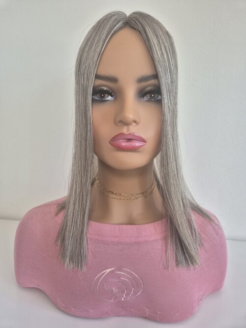 Tiny Topper Evelyn low-density hair topper 16 inch length grey salt and pepper displayed on a mannequin