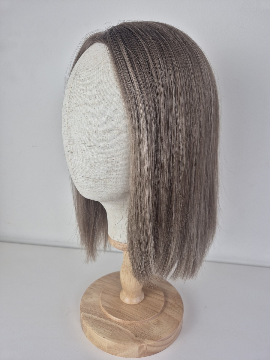 Hazel Lace Topper 14 inch bob dark blonde with subtle highlights displayed on a mannequin head