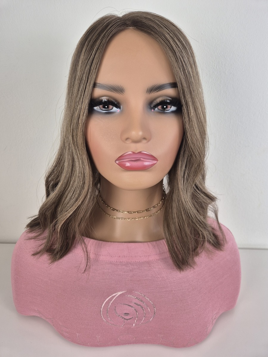 Maya Lace Topper 15 inches in length light brown with subtle blonde dimensions displayed on a mannequin