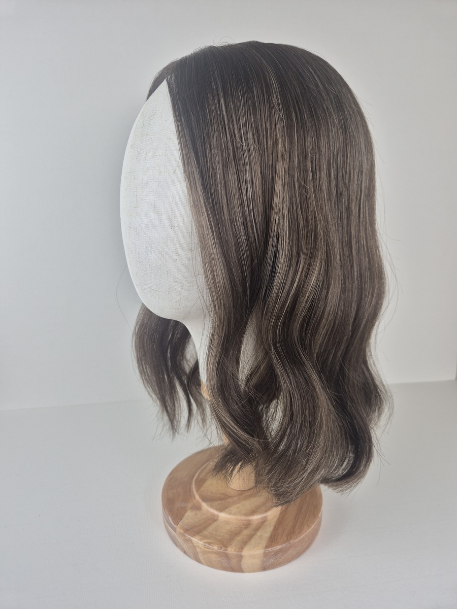 Carmel lace topper 16 inches dark brown with ash blonde highlights displayed on a mannequin