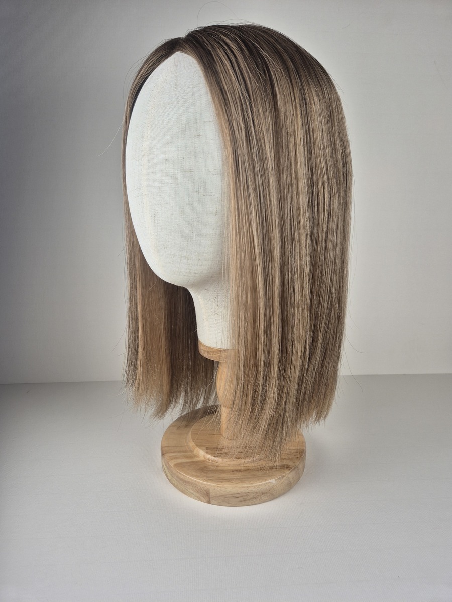Hayley Lace topper light brunette with beige and caramel highlights styled straight displayed on a mannequin