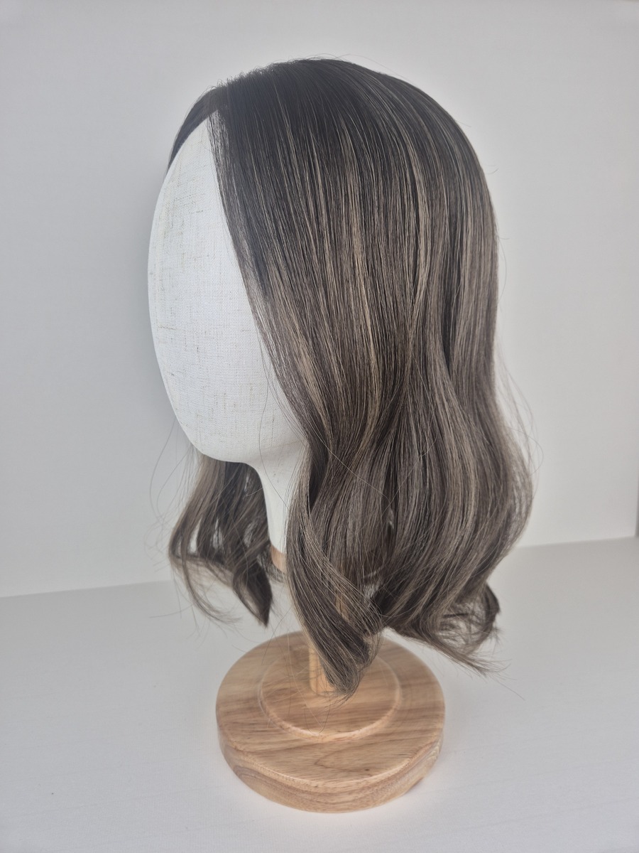 Mia lace topper 16 inches medium ash brown with highlights and a long root displayed on a mannequin