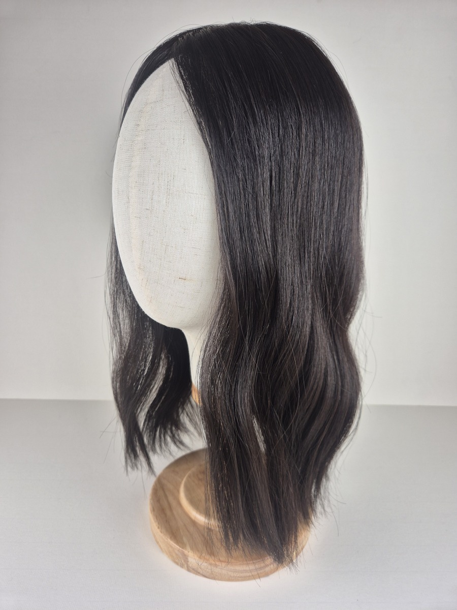 Rhea Ribbon Topper 18 inches darkest brown styled with a wave and displayed on a mannequin head