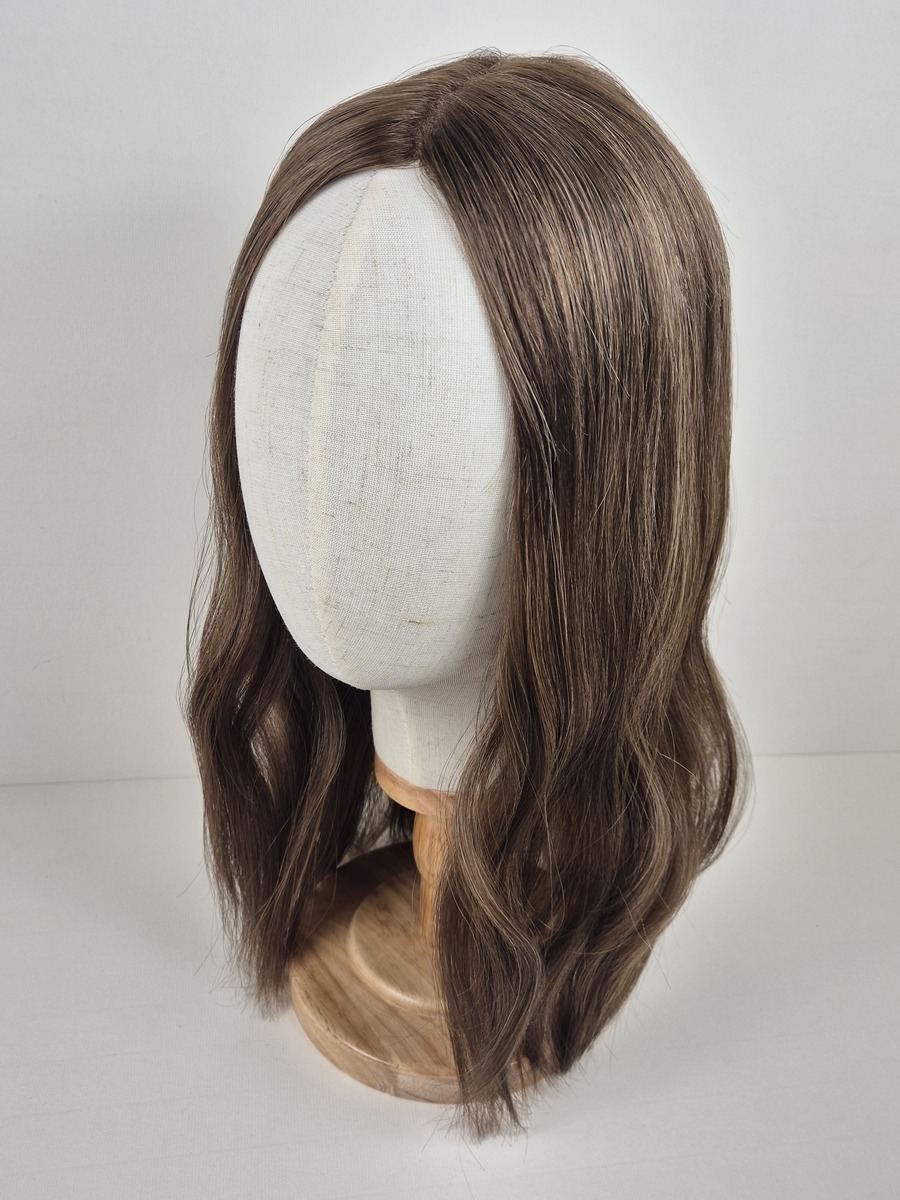 Maya Lace topper 18 inch A soft light brown with subtle ash and beige tones displayed wavy on a mannequin head